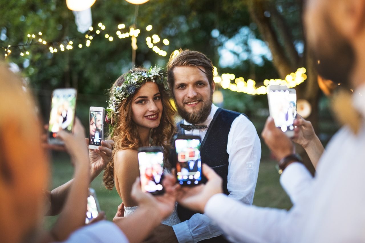 bride and groom posing for wedding photo
